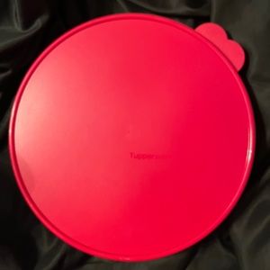 Tupperware round container with red holiday seal